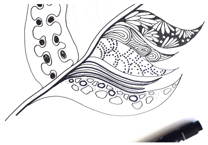 A partially completed Zentangle with pen